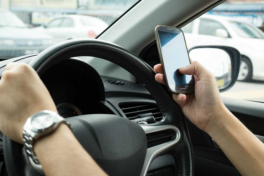 Distracted Driving in Ontario: Protecting Your Record in a Digital Age